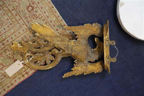 A pair of Chippendale style giltwood eagle wall brackets W.8.5in. H.17in.
